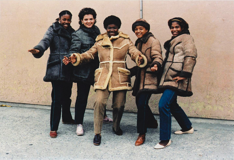 women posing in their Sheepskin coats